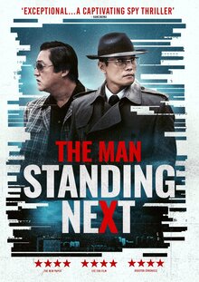 Poster of The Man Standing Next