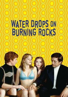 Water Drops on Burning Rocks