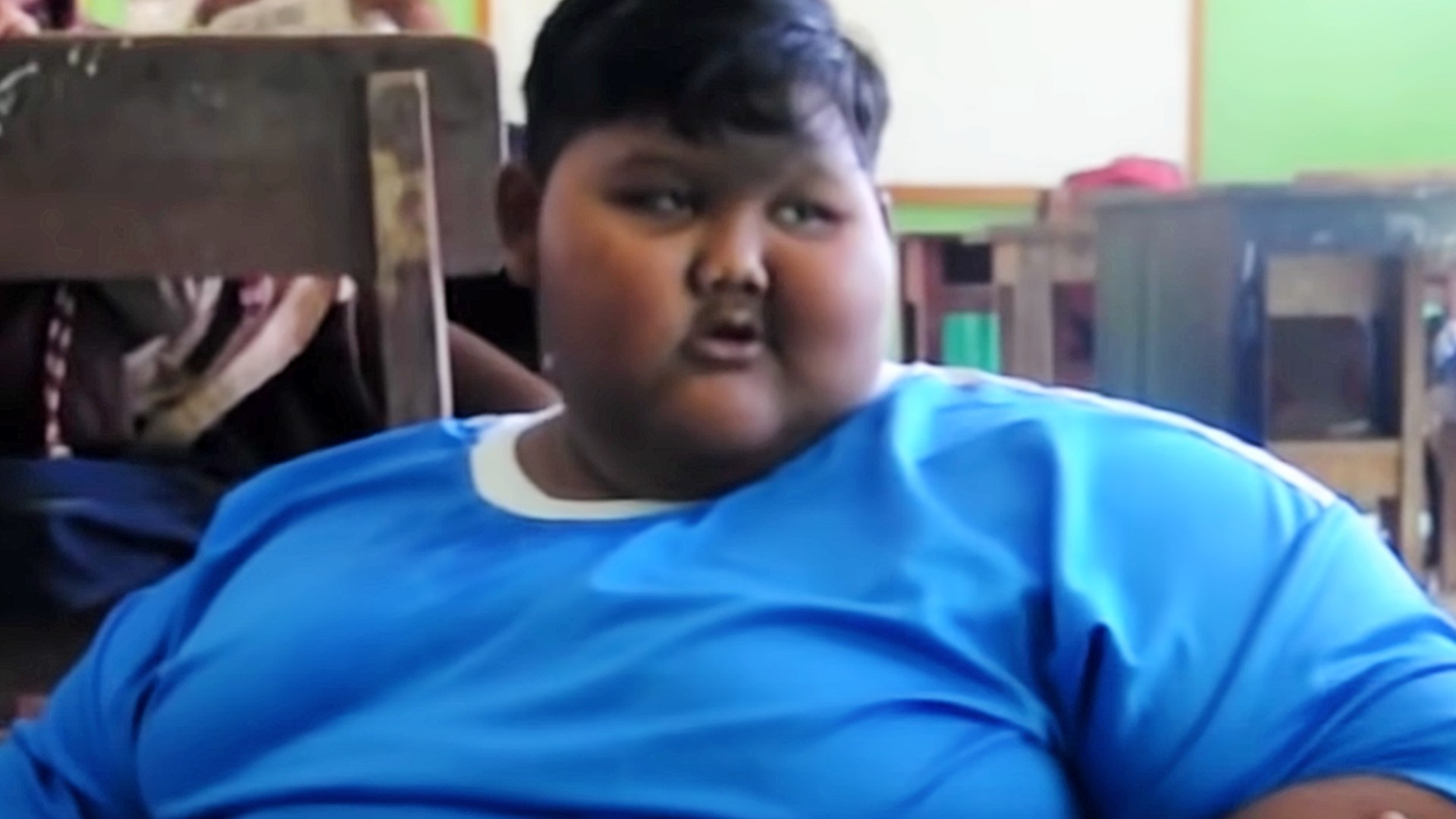Лицо толстого мальчика