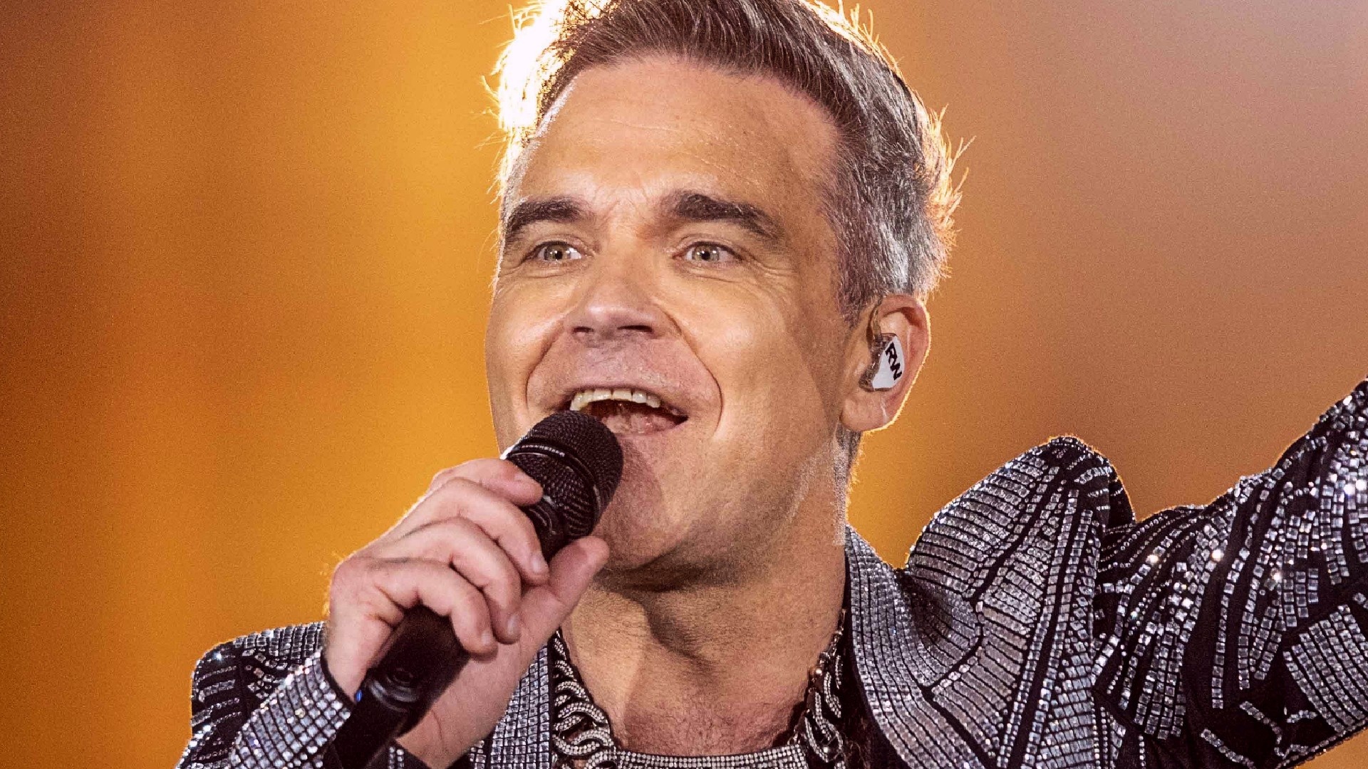 see who married rebel Robbie Williams (photo)